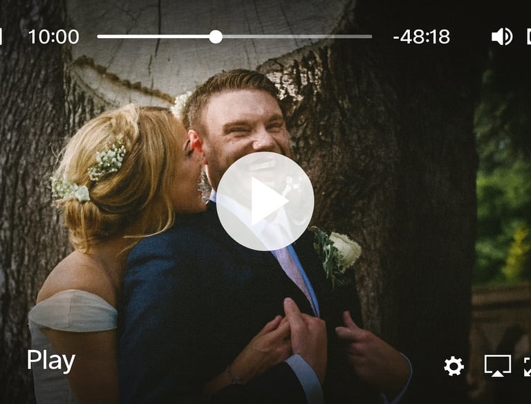 a man and woman kissing in a wedding video recorded in south wales