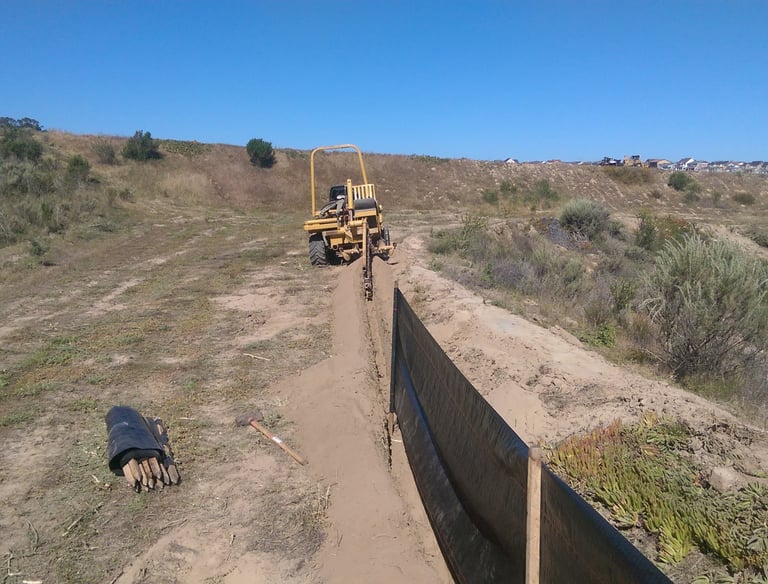Installation of a California tiger salamander exclusion fence at a project site near Monterey, CA