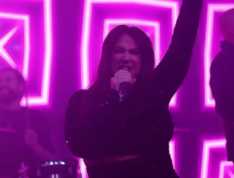 a woman in a black top and a man in a black top