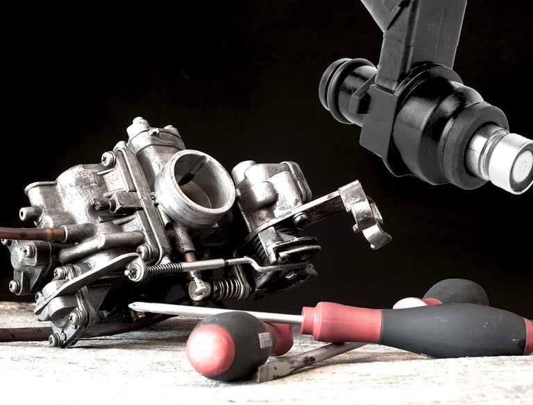 um carburador e um bico injetor e chaves philips