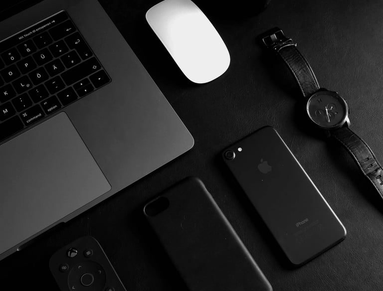 laptop phone mouse and watch
