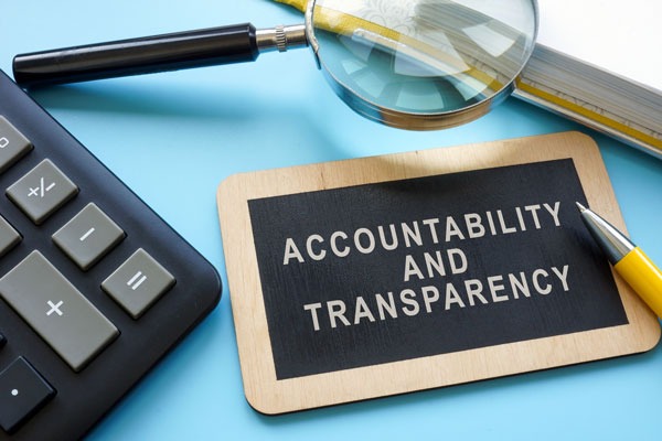 accountability and transparency sign on desk