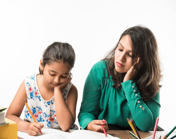 Teacher offering personalized attention to students at Ciel Knowledge coaching center for IIT-JEE