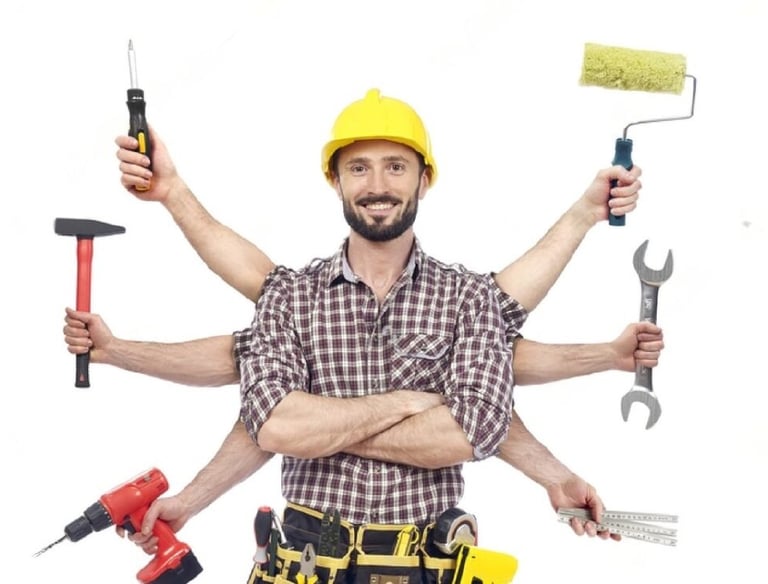 Handyman multitasking with multiple tools in London, including a hammer, screwdriver, wrench, and pa