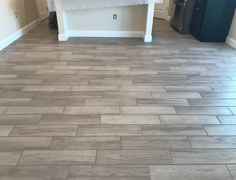 Grout colored sealed to match the tile 