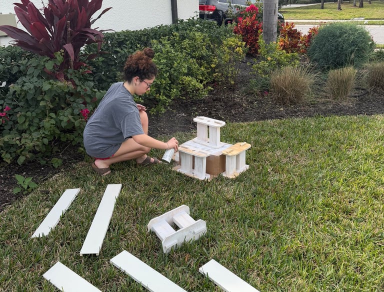 Student building the Sunshine Skyway bridge, strengthening connections across FL DECA chapters.