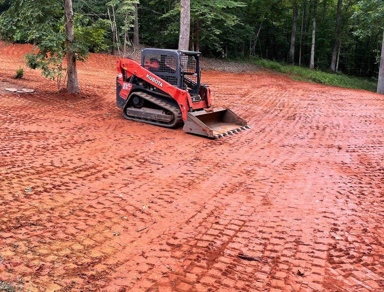 skid steer and final graded yard
