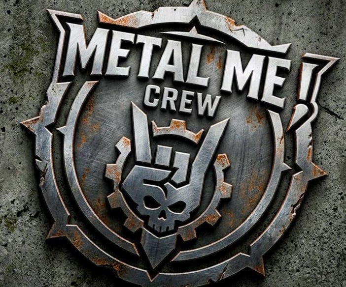 Metal Me Crew logo featuring a heavy metal skull and hand gesture on a rusty steel emblem.