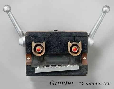 Assemblage robot head built by artist Tal Avitzur from vintage foundry mold.