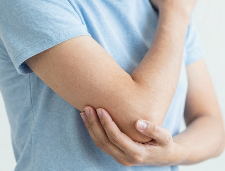 Orthopedic surgeon reviewing knee X-rays with a patient in a bright consultation room.
