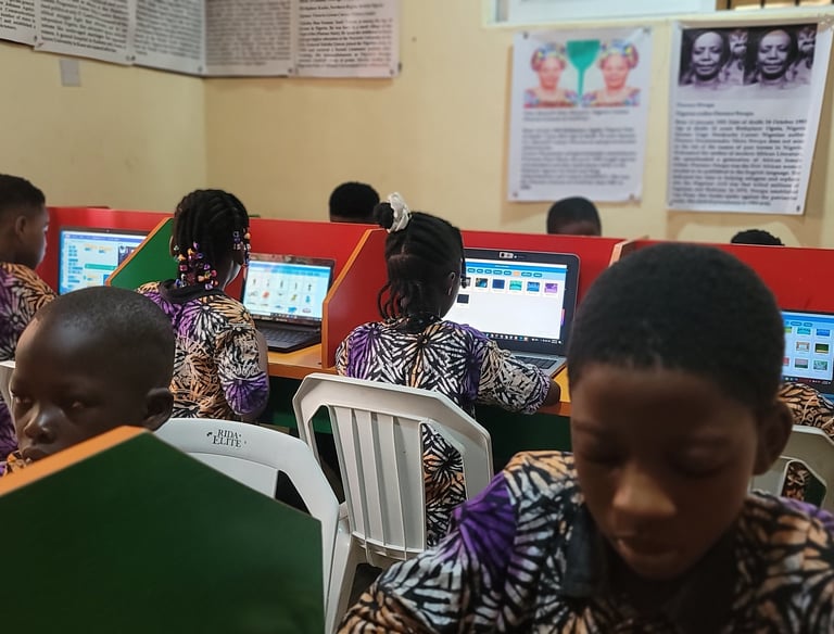 A group of pupils learning digital literacy in their school's computer lab