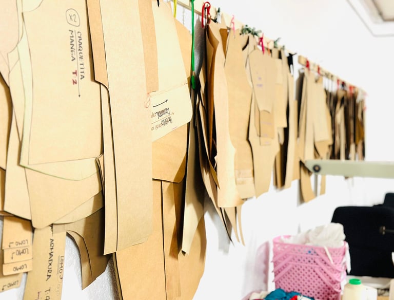 a bunch of paper cutouts of paper cutouts of clothes