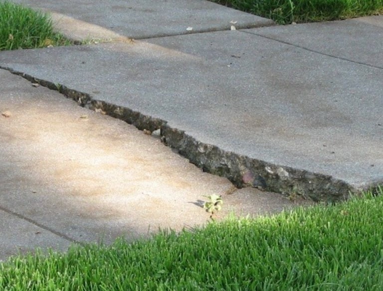 a fire hydrant sitting on the sidewalk