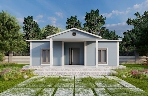 a small house with a large lawn and a small house
