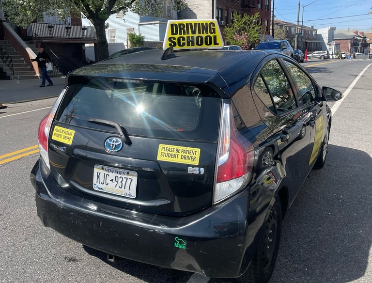 a taxi cab cab cab with a driver's license plate