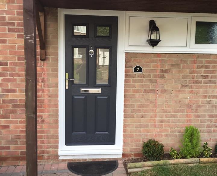 black composite front door with silver hardware fitted in Stubbington by Buildmydoor