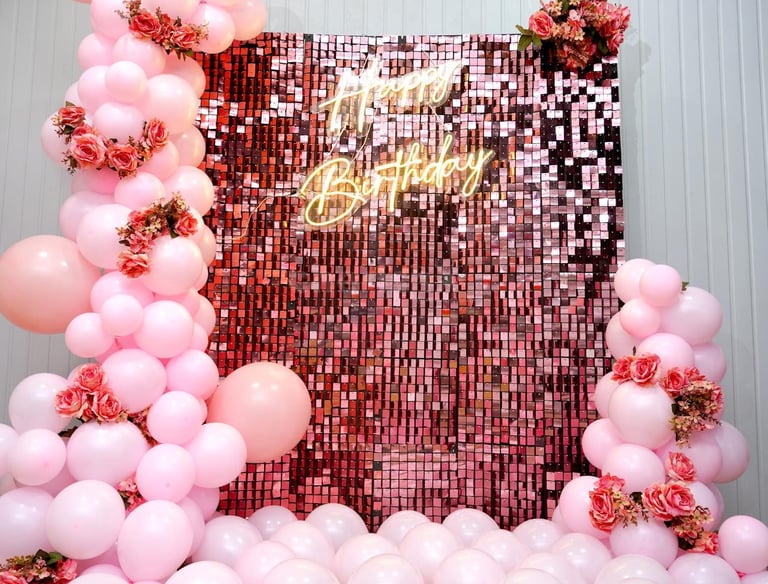 a birthday party with balloons and balloons