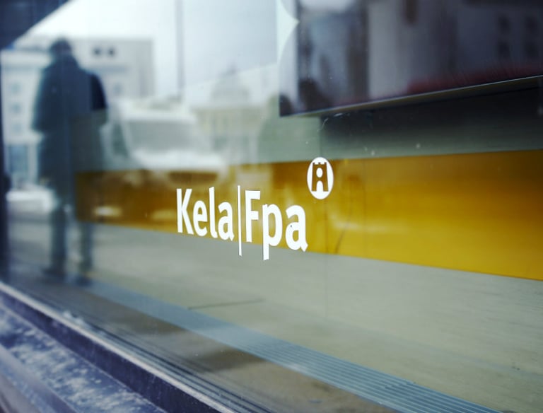 KELA, Fpa, unemployment services sign on glass door 