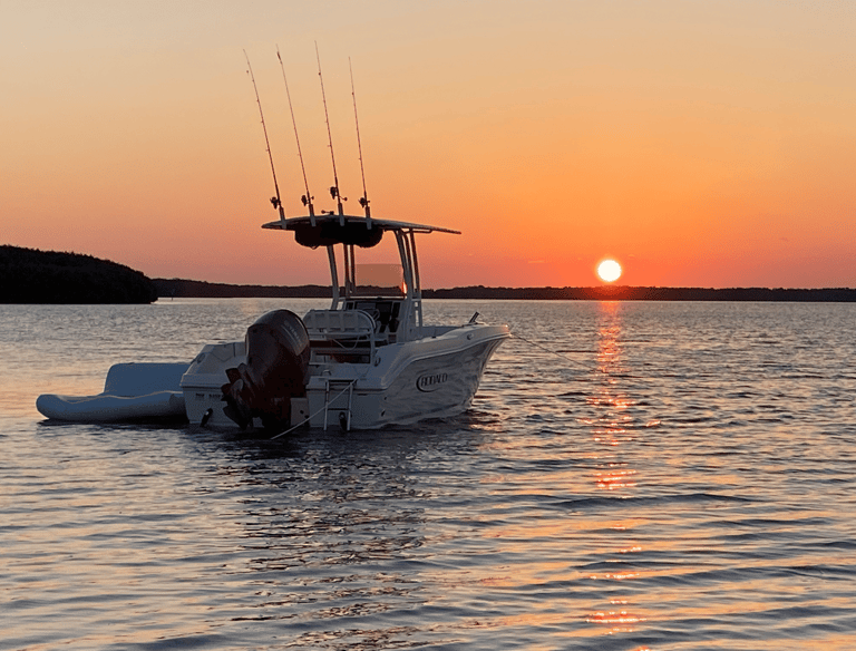 Boat on the water at sunset