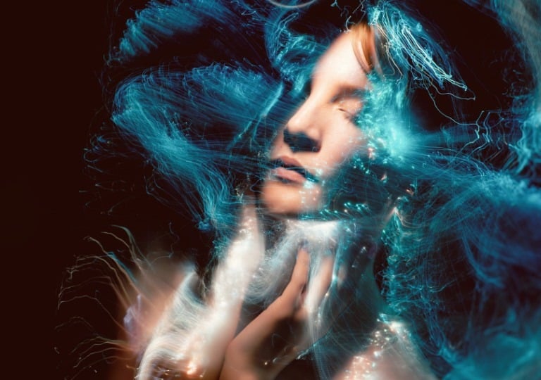 Fine art photography courses explore creative portrait techniques with ethereal light effects.