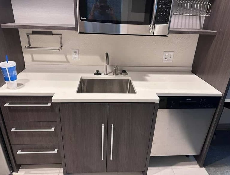 Integrated sink and quartz top with custom vanity cabinets