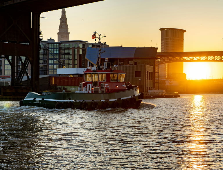 Ohio riverfront with industrial backdrop, showing Buckeye Venture Group’s wholesaling services