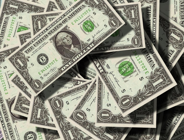 A stack of money to represent our commitment to cash offers, free from contingencies.