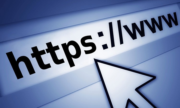 Mouse cursor clicking a secure HTTPS web address URL in a browser for safe internet browsing.