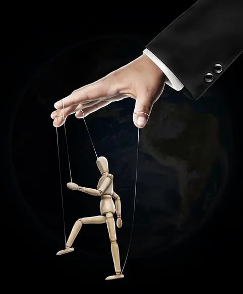 a person holding a puppet with a puppet