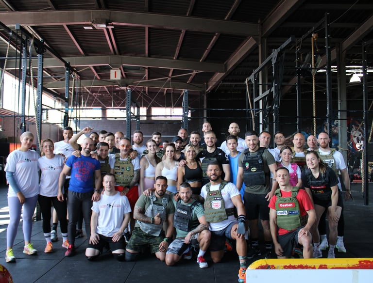a group of people standing in a gym