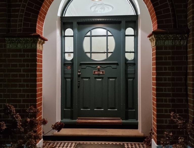 Exterior painting of period front door in Balham, completed by Pure Perfection London.