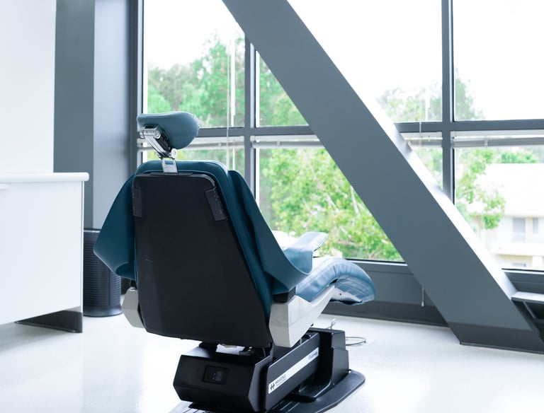 A dental chair with a view to the outside.