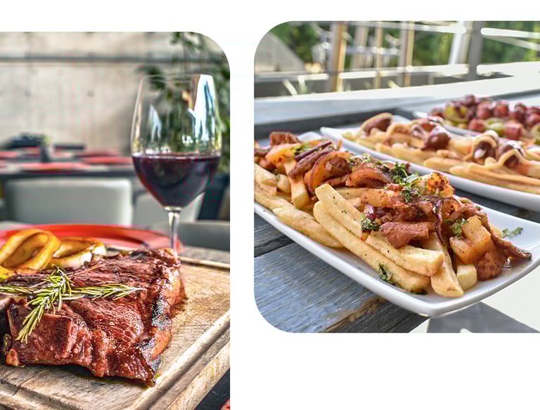 Grilled T-bone steak on a wooden board served with red wine and loaded gourmet fries.