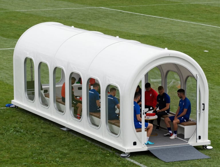 A sleek hyperbaric oxygen chamber set up inside a mobile clinic van with bright, clean lighting.