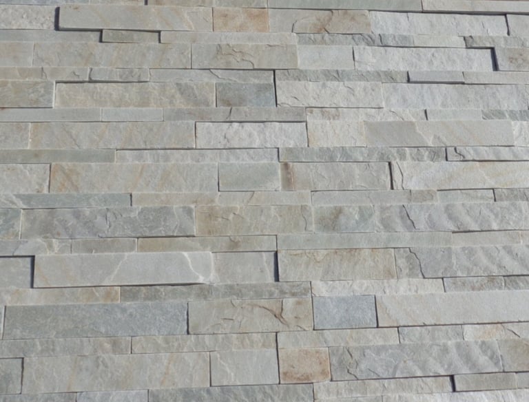 Stone wall with rectangular shaped natural stone, grey shades