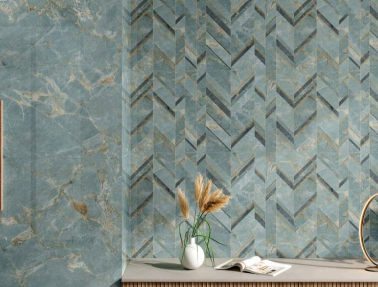 Modern interior with blue marble-patterned porcelain tiles wall and a geometric chevron design.