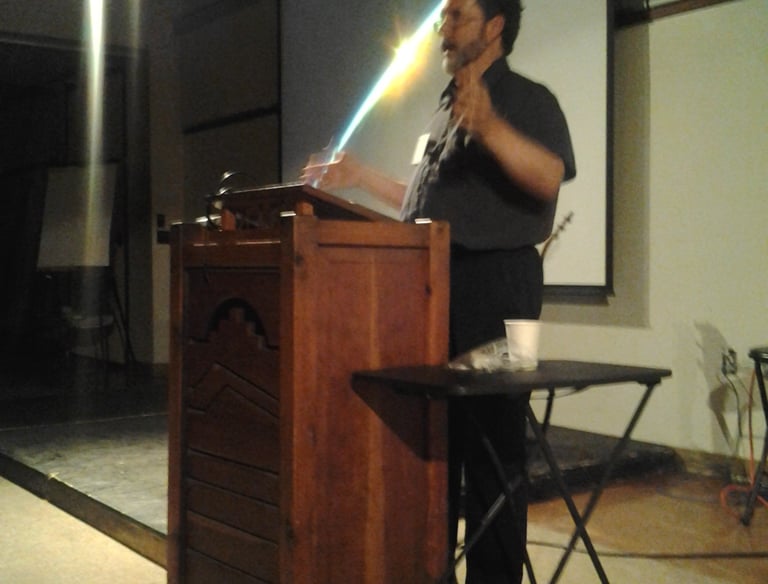 Image of Craig Chalquist presenting.