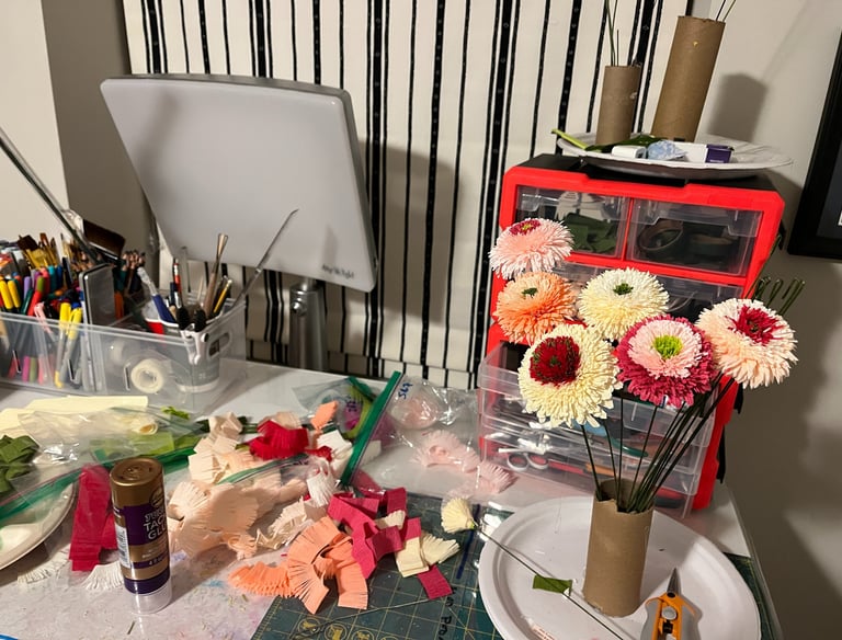 a view of part of the artist's paper flower studio