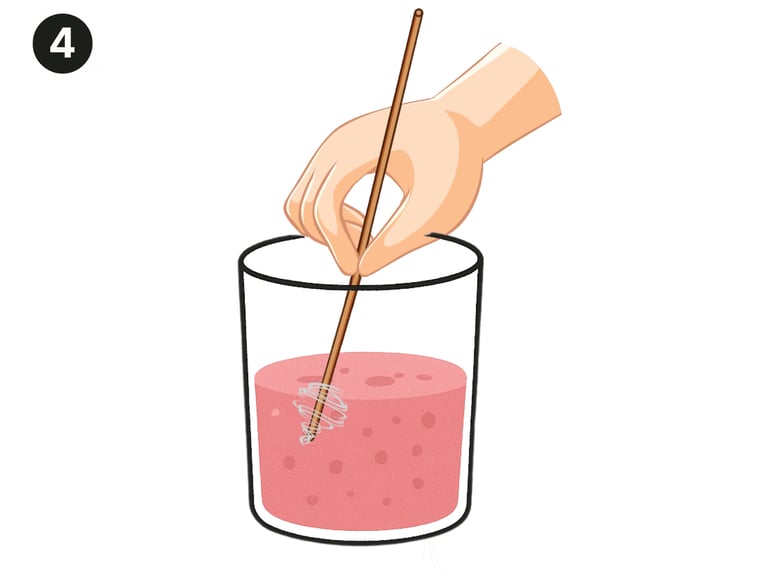 stirring strawberry juice
