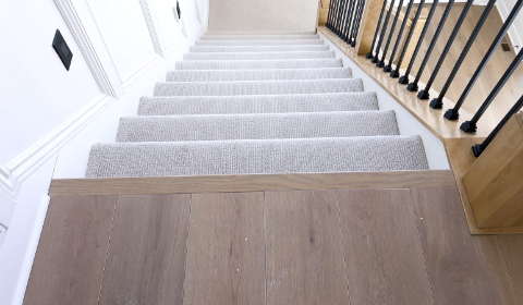 grey carpet stains with wooden floor landing