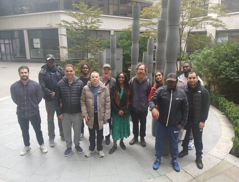 a group of people at Guilt of Cain after Black History Month Quest