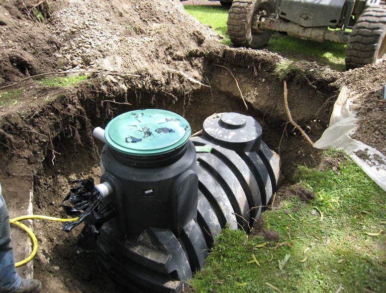 a man is standing in the middle of a hole in the ground