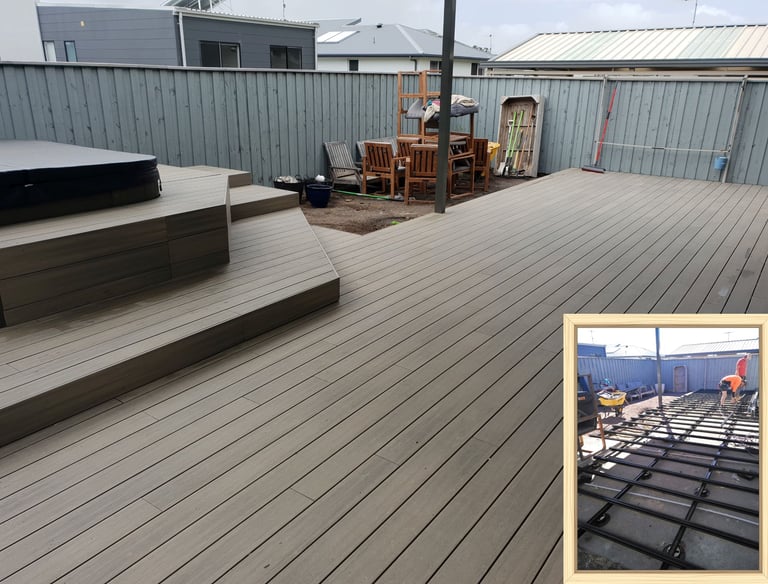 low level composite deck on aluminium substructure. Steps up around spa pool