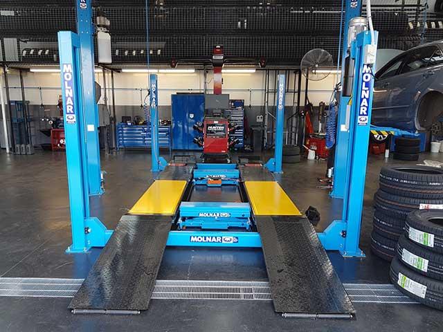 Molnar 4 post vehicle hoist installed by Safe Lifting Australia
