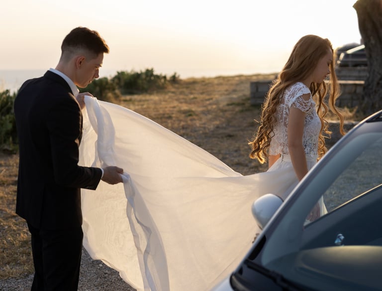 Bride entering wedding limo