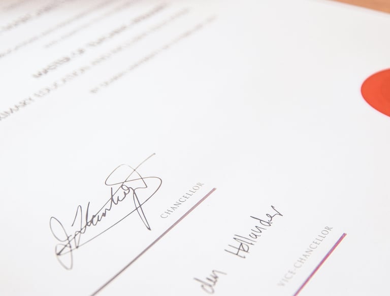 a close up of a signed document with a certification seal