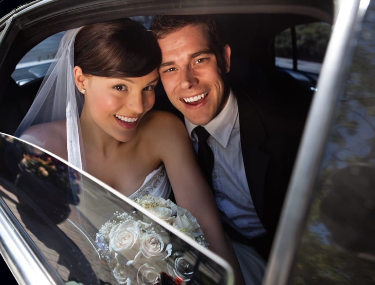 Luxury limousine arriving at upscale Charlotte event venue, providing premium chauffeur service