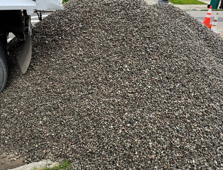 a truck with a cement mixer and a cement mixer