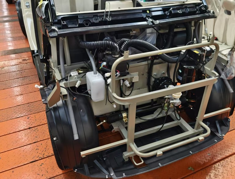 closeup view of power steering and brake pump from Impulse Electromotive Nano-3 Micro EV car