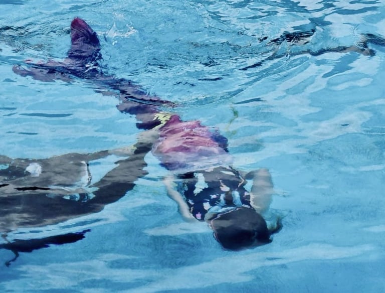 Mermaid learning to swim
